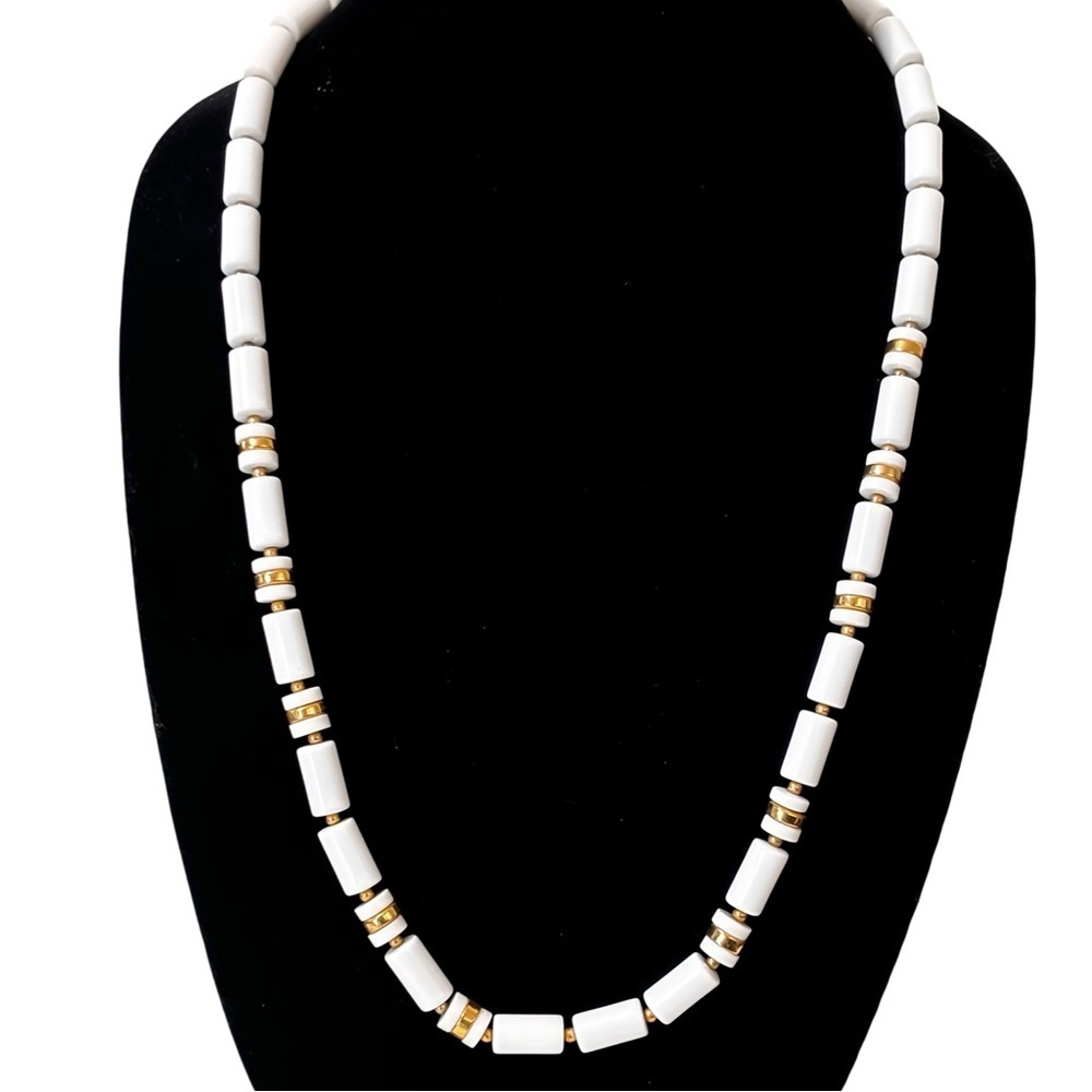 Vintage white acrylic with gold tone beads and closure necklace